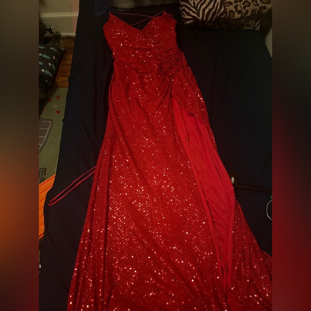 A deep red sequin dress, can be used for technically any event!! Venmo only.